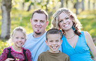 Kelowna Family Photos in the Spring Orchards in Bloom